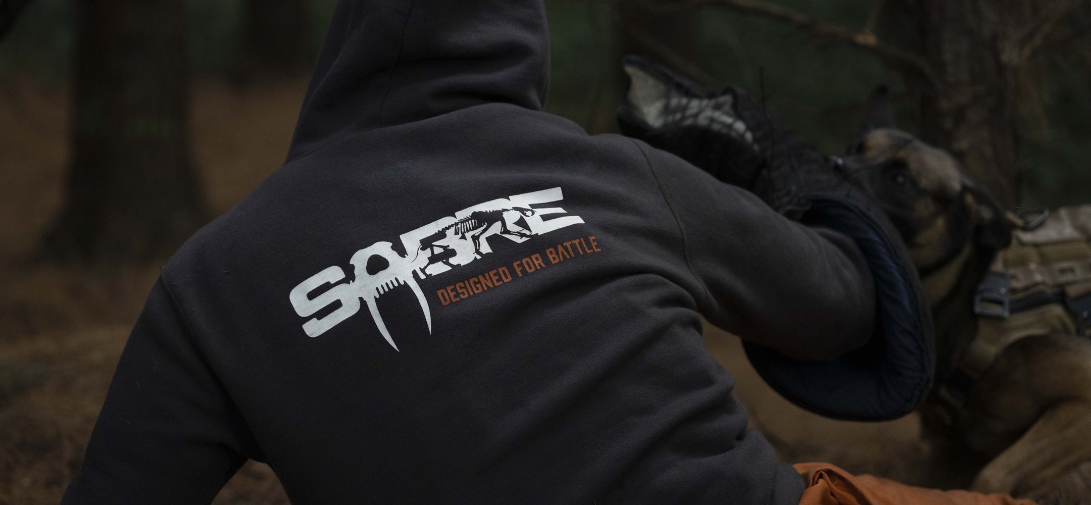 Sabre Hoodie on Dog Handler